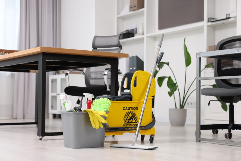 cleaning-service-mop-bucket-with-supplies-wet-floor-sign-office